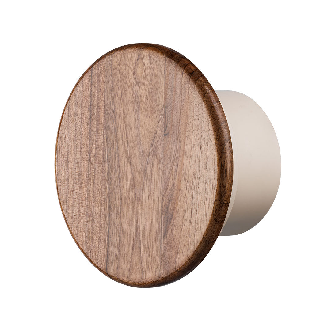 Side view of round bathroom fan with walnut front panel